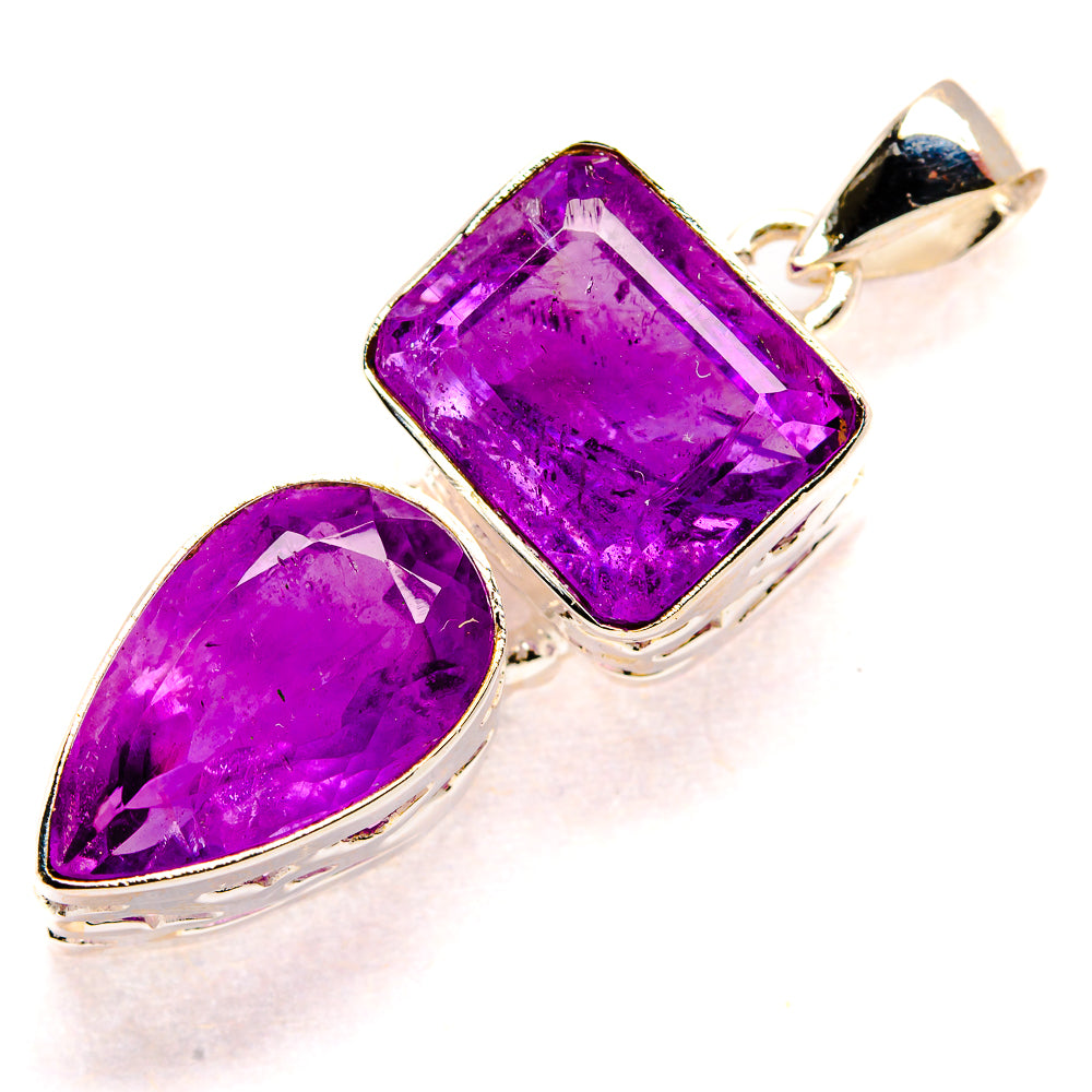 Sterling silver amethyst pendant with faceted rectangular center and teardrop side stone