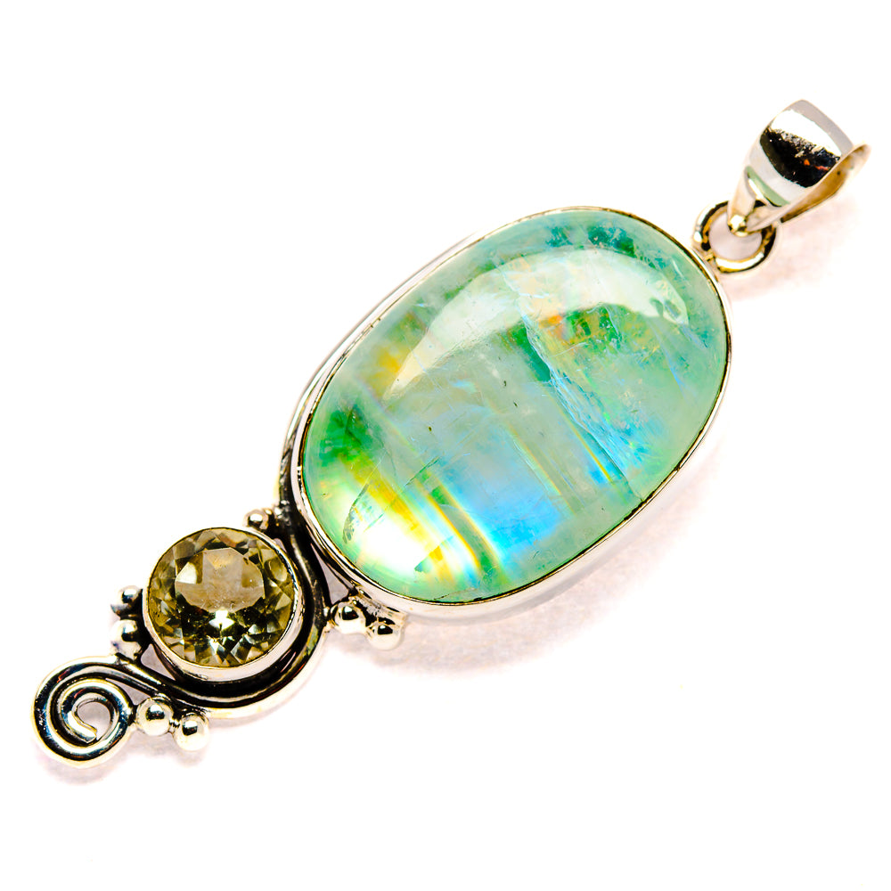 Sterling silver pendant with oval opalescent green stone and round accent stones