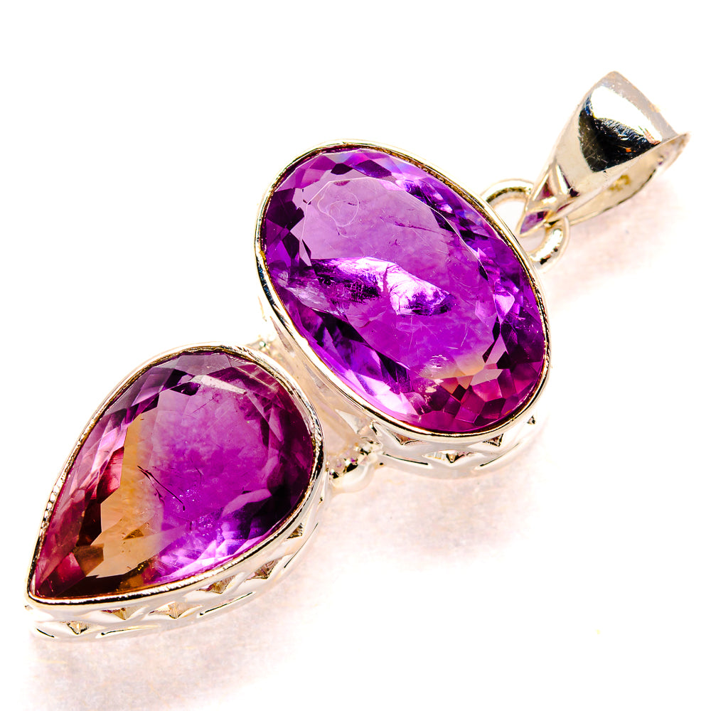 Faceted ametrine pendant in oval sterling silver setting with two purple gemstone stones