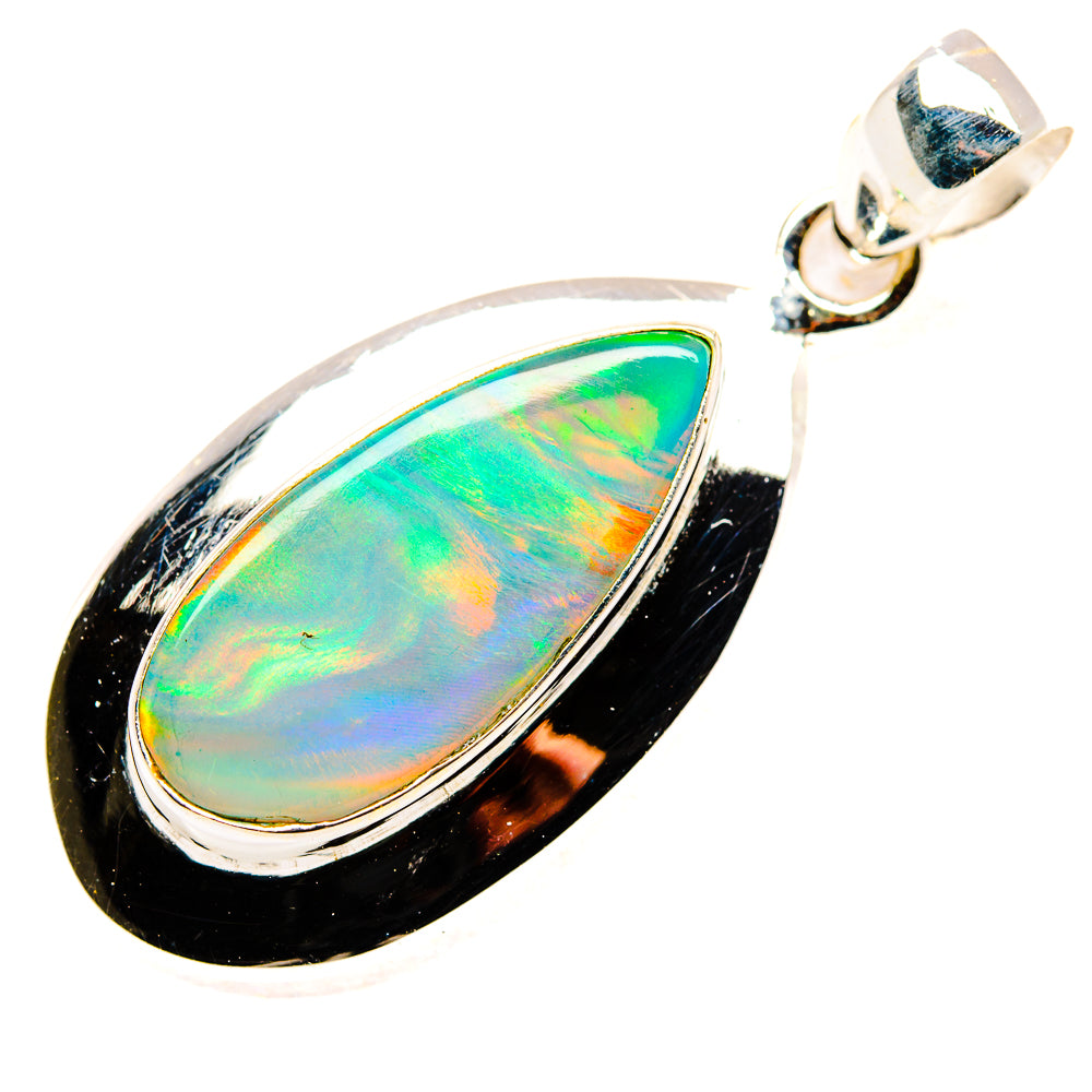 Teardrop opal pendant in sterling silver with green-blue iridescent stone and black border