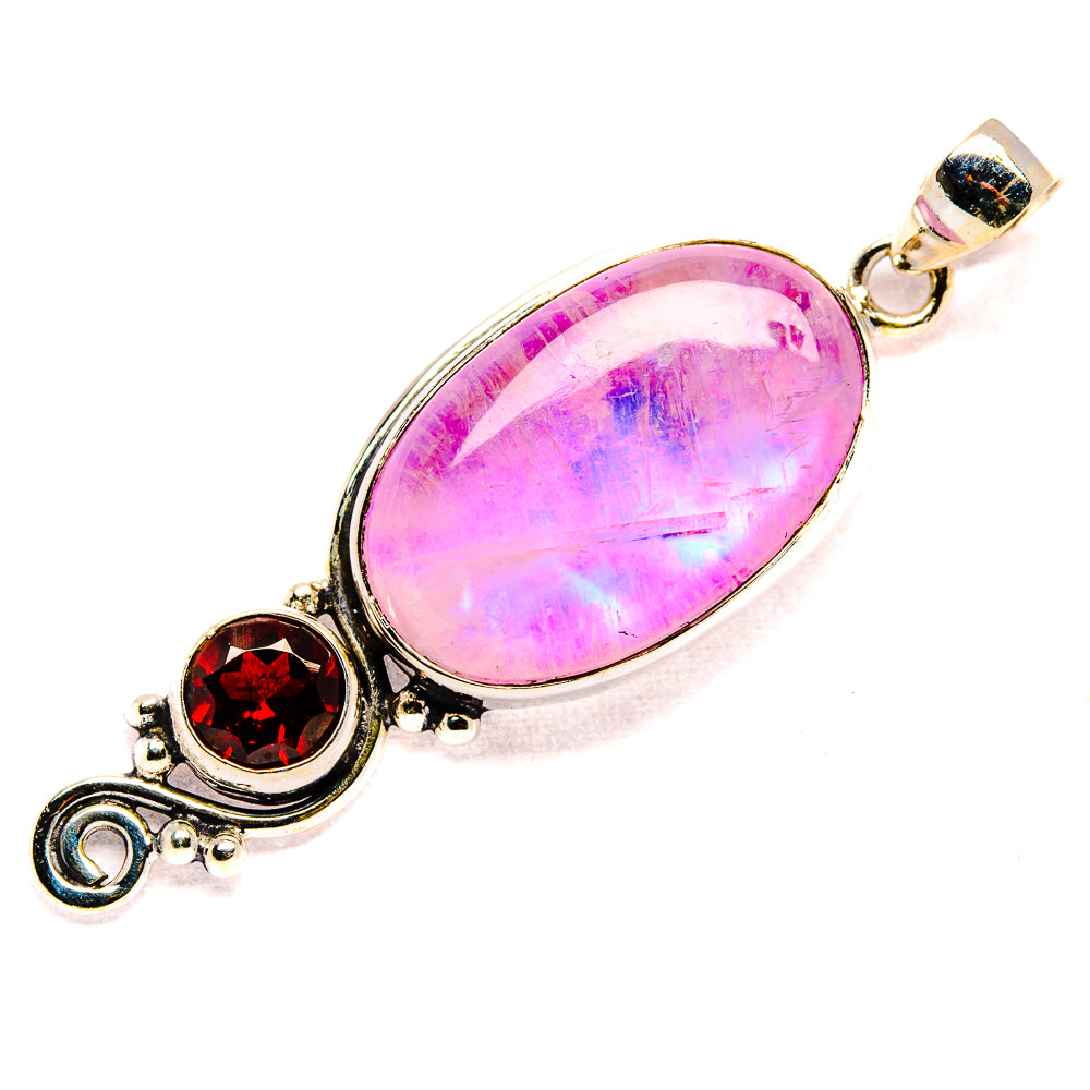 Oval pink moonstone with red garnet accents sterling silver pendant, top bail visible