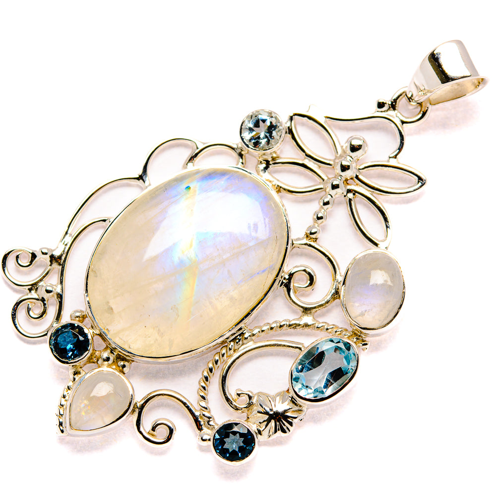 Sterling silver oval rainbow moonstone pendant with blue topaz gemstones and floral settings