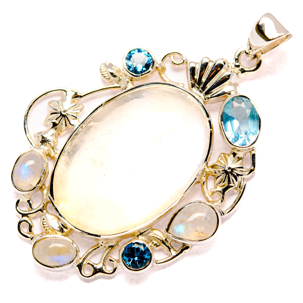 Silver-tone moonstone pendant with blue topaz stones and bezel-set opal center