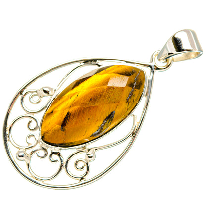 Sterling silver tiger eye teardrop pendant with oval filigree bezel and bail