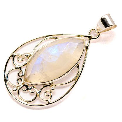 Iridescent moonstone teardrop pendant with ornate silver scrollwork and hanging bail