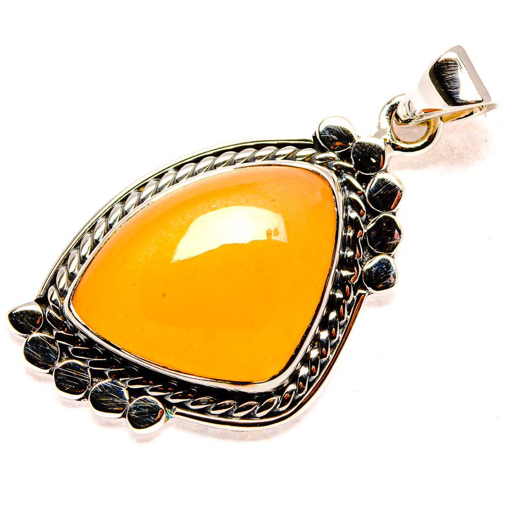 Peach moonstone teardrop pendant in 925 silver with black bead halo and bail
