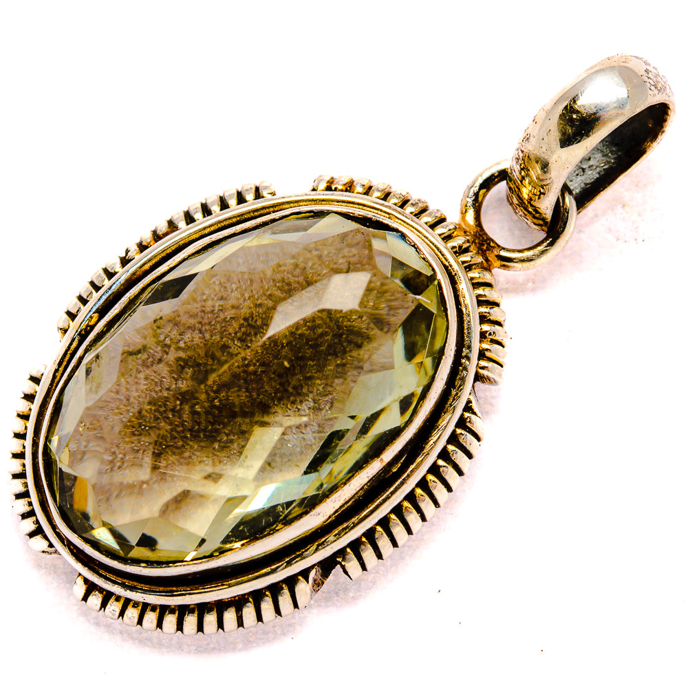 Sterling silver oval pendant with faceted gemstone, top loop, and textured beaded rim