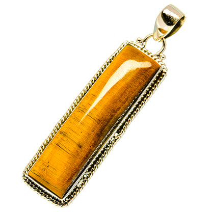Rectangular tiger eye pendant in sterling silver bezel with top loop and bail