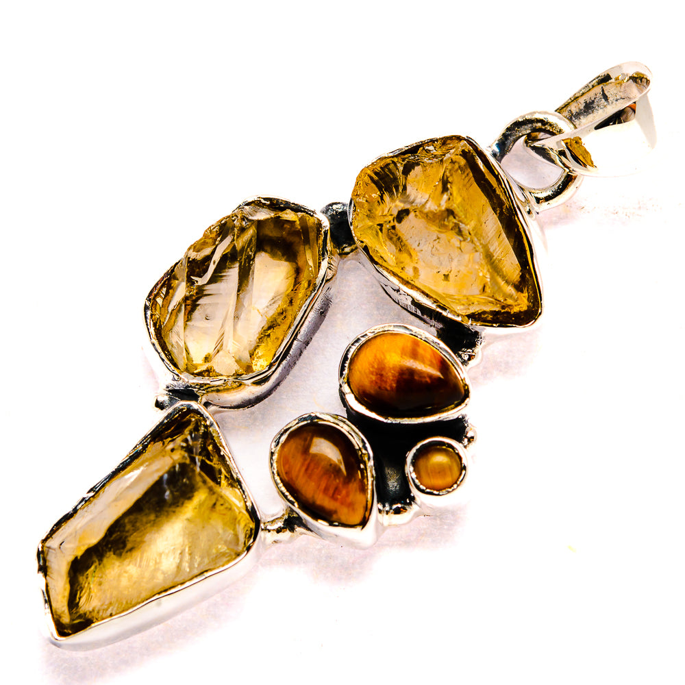 Silver charm pendant with rough yellow citrine and tiger eye stones, multi-shape