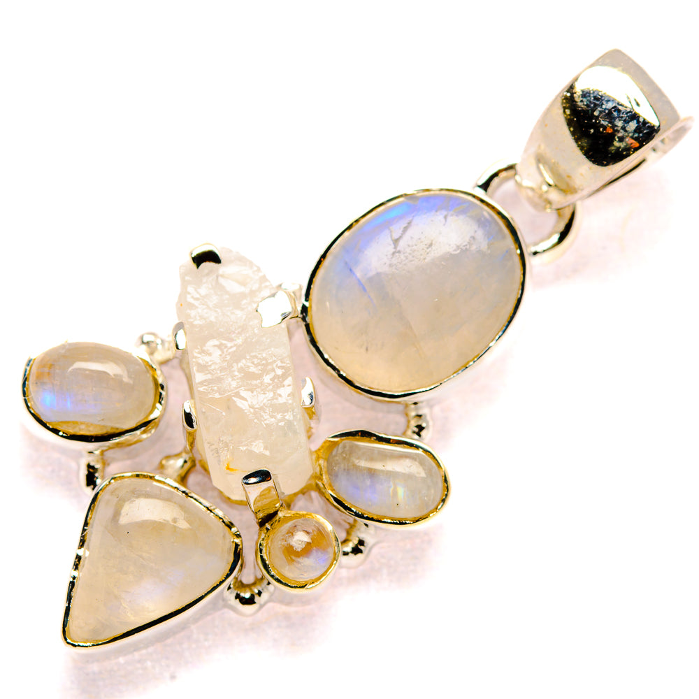 Sterling silver moonstone pendant with oval centerpiece and teardrop plus round stones