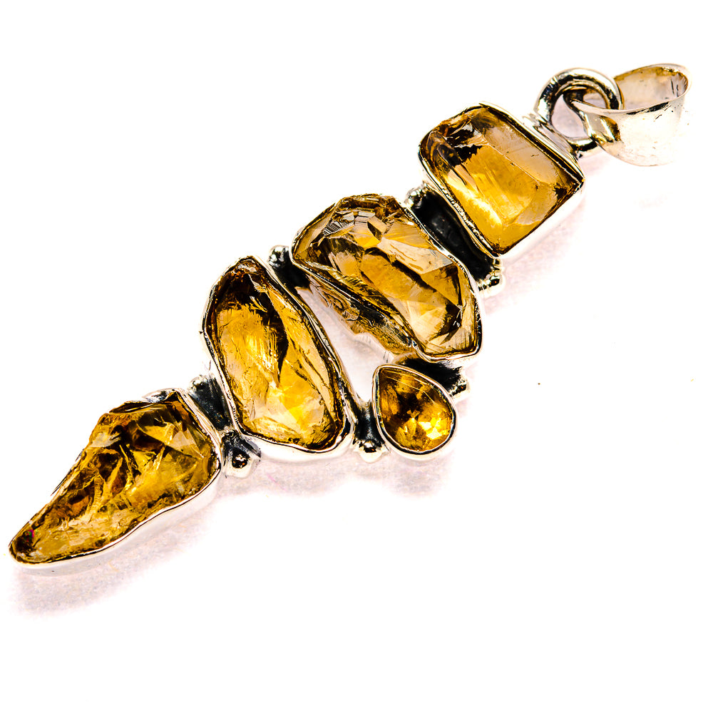 Rough citrine pendant in 925 sterling silver with faceted amber stone drops and loop bail