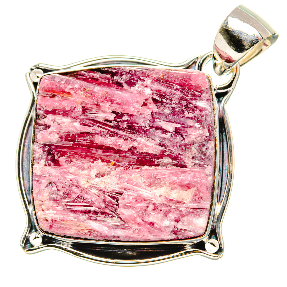 Rough pink tourmaline pendant in polished 925 sterling silver bezel setting