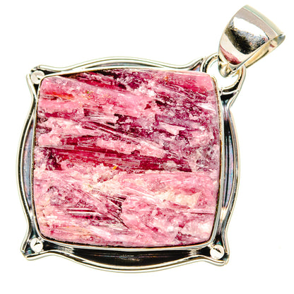 Rough pink tourmaline pendant in polished 925 sterling silver bezel setting