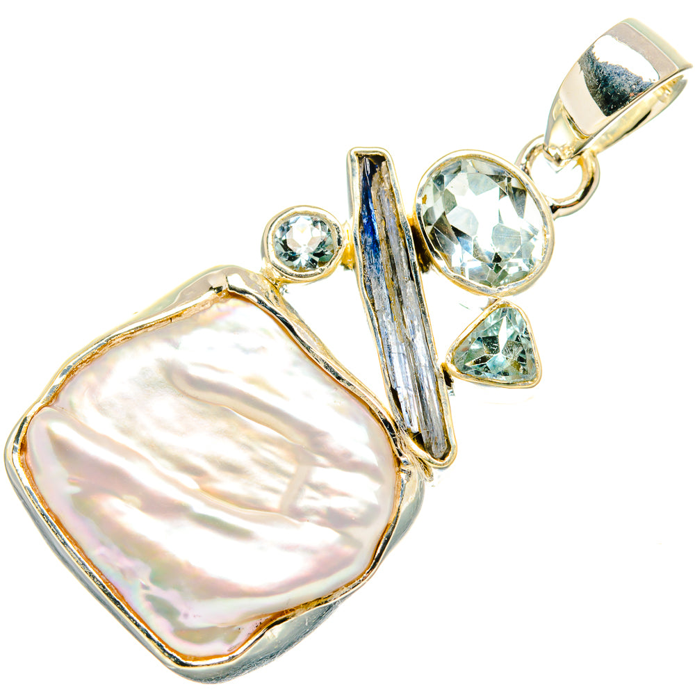 Sterling silver pendant with mother-of-pearl and blue pear-cut gems
