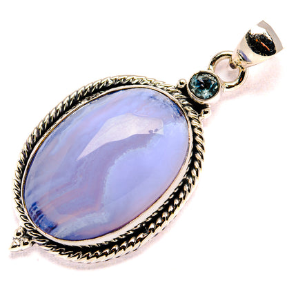 Sterling silver oval blue gemstone pendant with rope bezel and blue round top stone