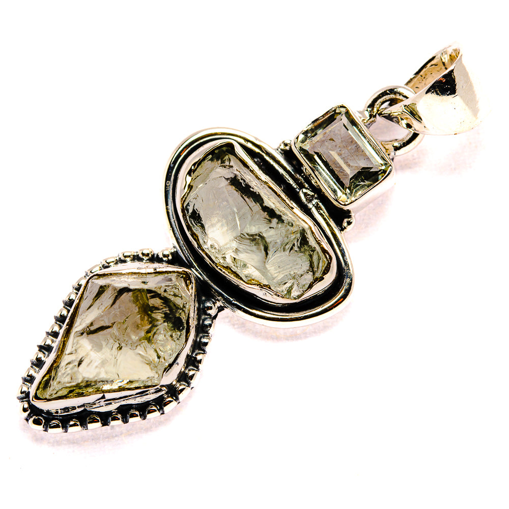 Sterling silver pendant with rough green amethyst oval center and teardrop side stone