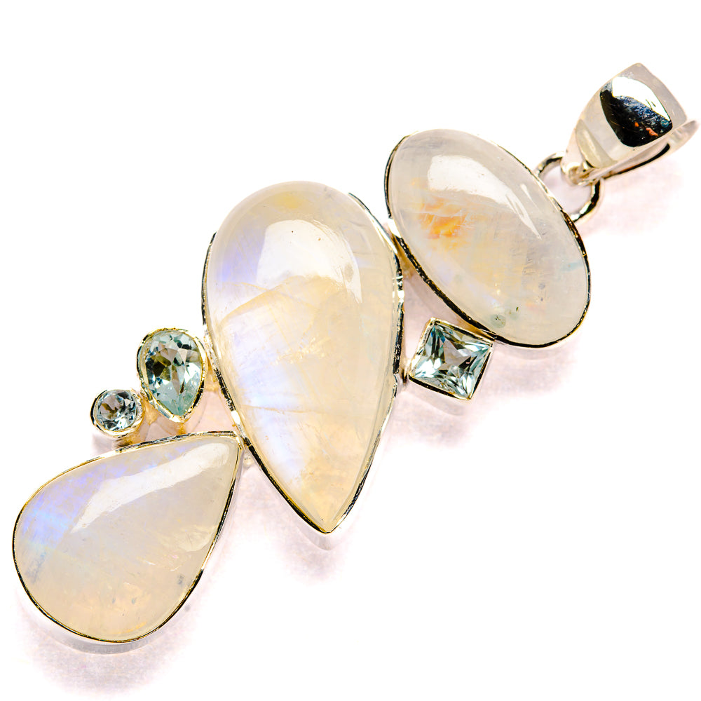 Opal-like teardrop pendant with sterling silver prong settings, includes blue topaz accents
