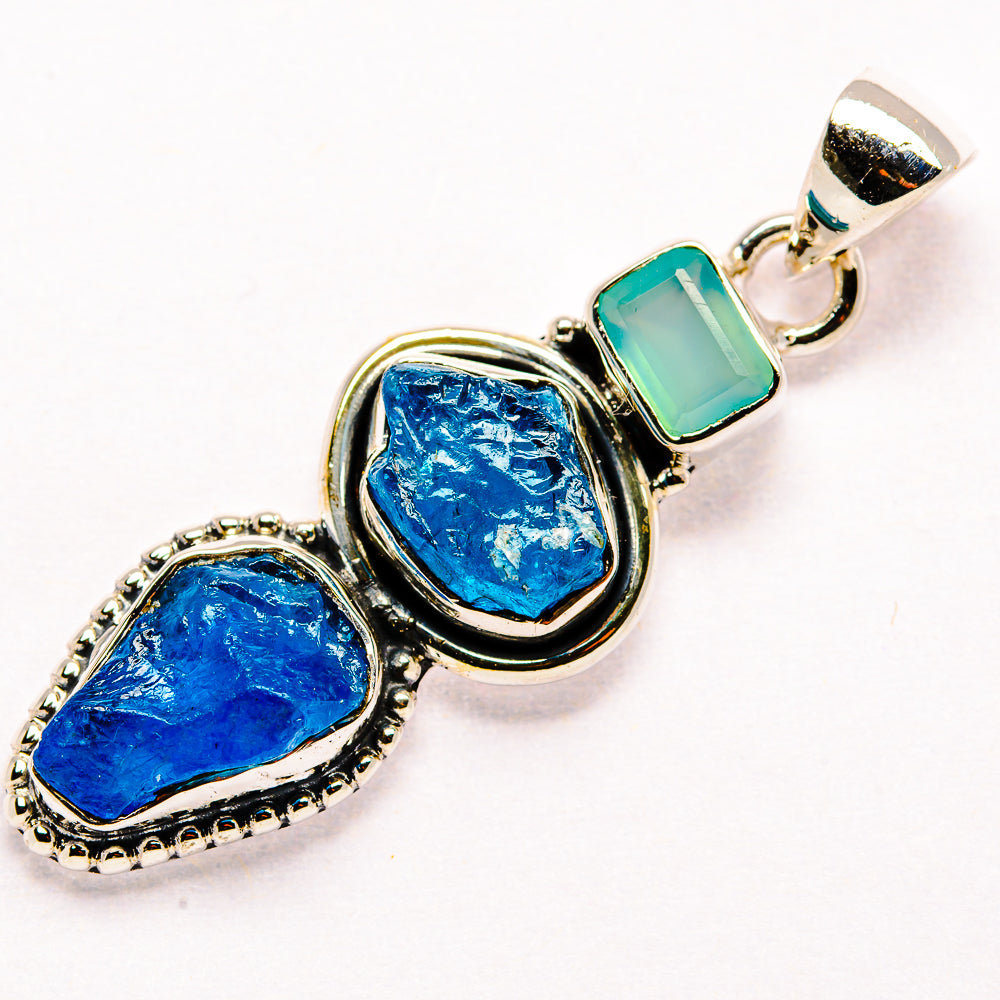 Sterling silver pendant with rough blue and aqua stones, triple-stone design