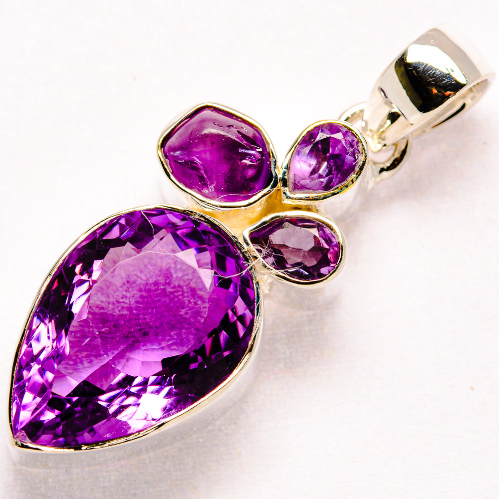 925 sterling silver faceted amethyst pendant with teardrop center and four accent stones