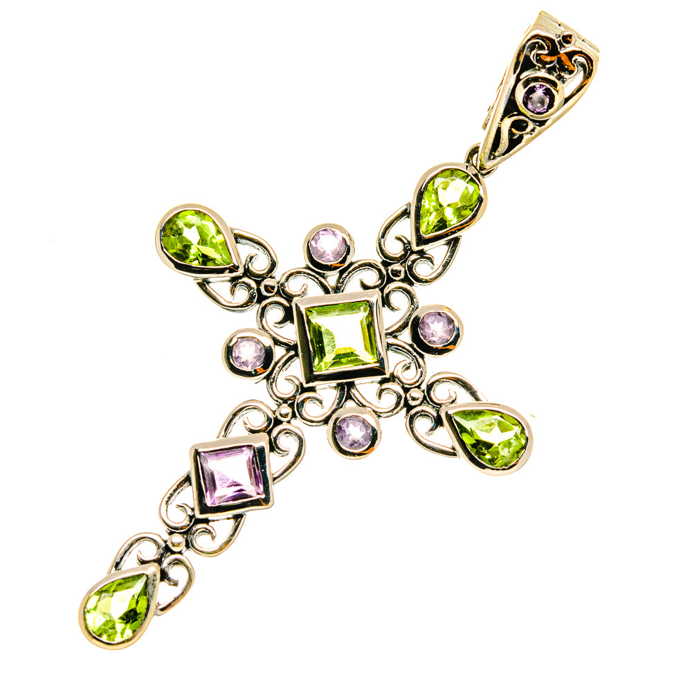 Cross pendant with prong-set square and oval gemstones in peridot green and amethyst purple.