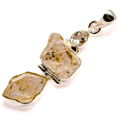 Sterling silver Herkimer-style quartz pendant with two prong-set rough stones