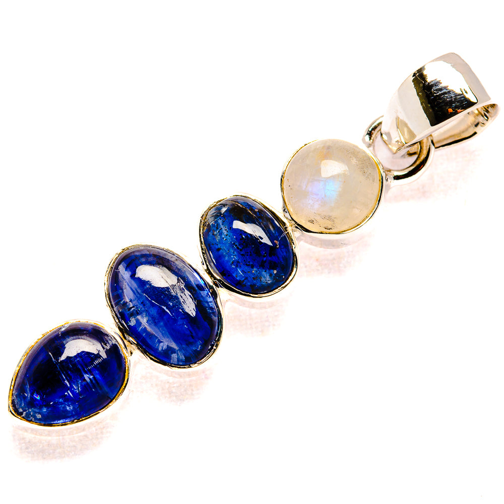 Sterling silver pendant with oval rainbow moonstone center and three oval deep blue stones