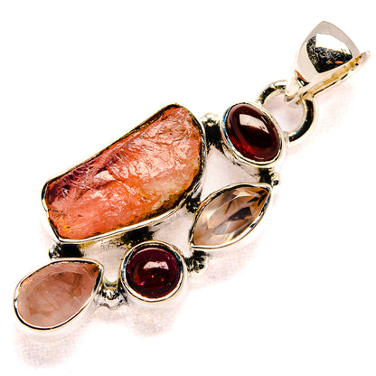 Sterling silver pendant with rough rose quartz and red garnet stones