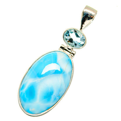 Sterling silver pendant with oval blue larimar and blue topaz accents