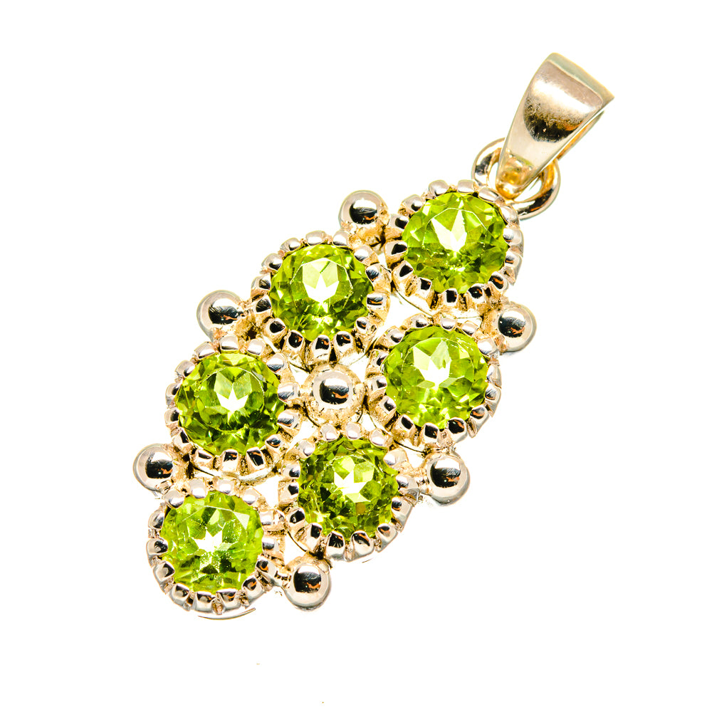 Sterling silver peridot pendant featuring five round peridot-green gemstones