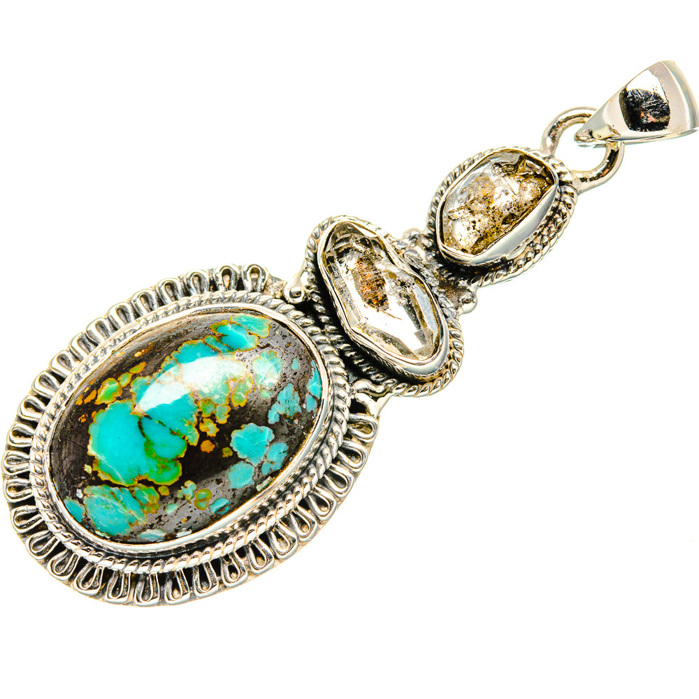 Sterling silver pendant with oval turquoise cabochon and gold-tone bail, open setting