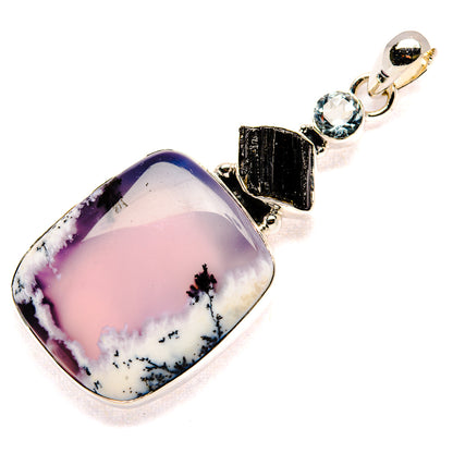 Sterling silver pendant with oval dendritic opal, black tourmaline bar, and round blue topaz
