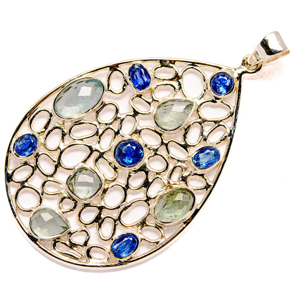 Sterling silver teardrop pendant with blue round accents and pale oval stones