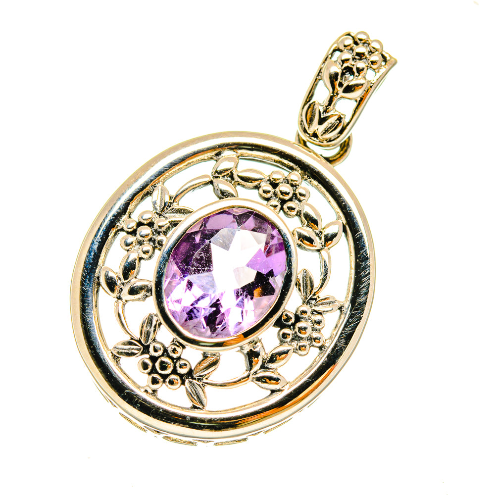 Amethyst pendant in gold-tone 925 sterling silver with faceted purple gemstone bezel