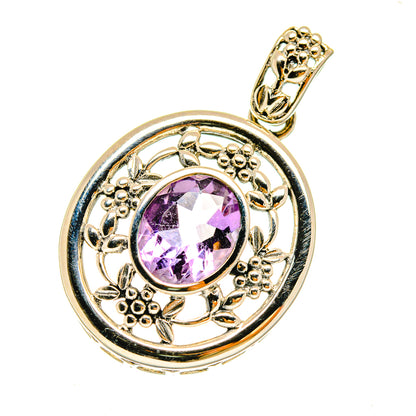 Amethyst pendant in gold-tone 925 sterling silver with faceted purple gemstone bezel
