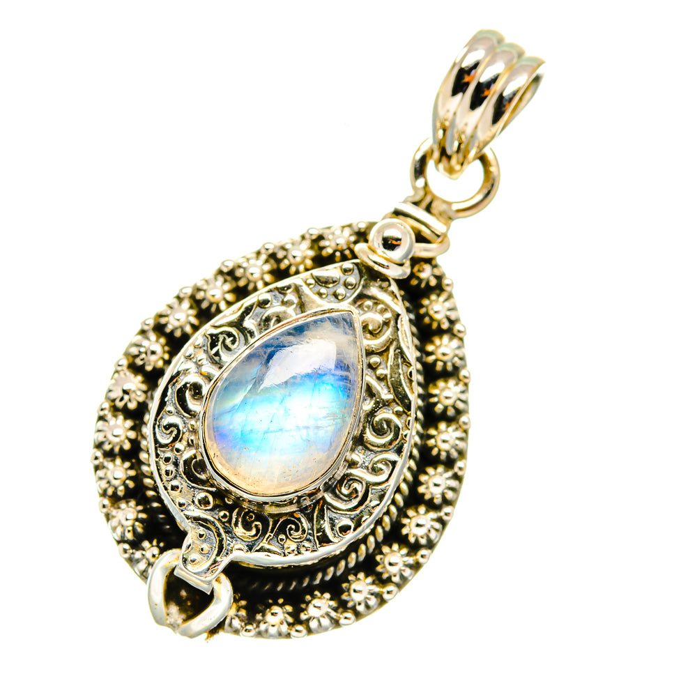 Sterling silver moonstone pendant with ornate border and iridescent blue pear cabochon