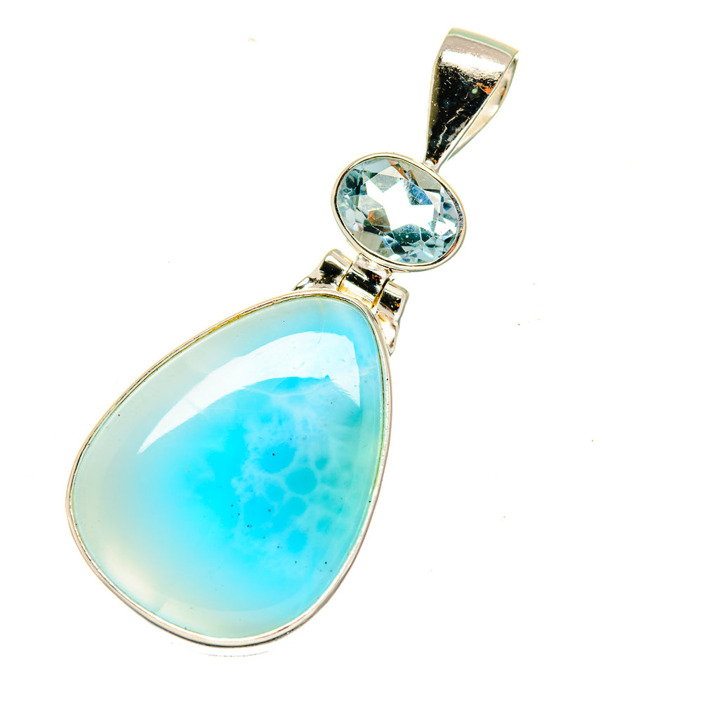 Sterling silver pendant with teardrop larimar cabochon and round blue topaz bezel