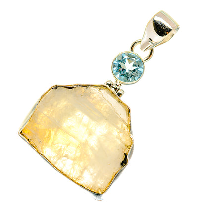 Sterling silver pendant with rough moonstone and round blue topaz bezel
