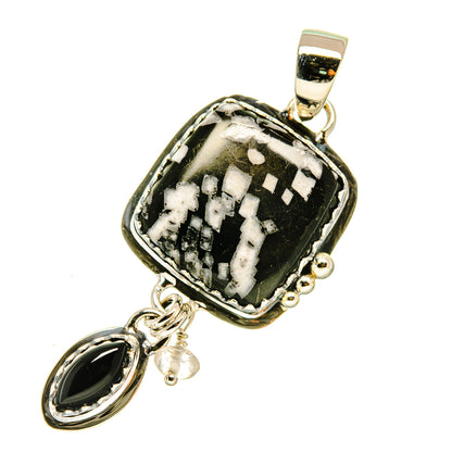 Sterling silver pendant with black-and-white square stone and oval black drop