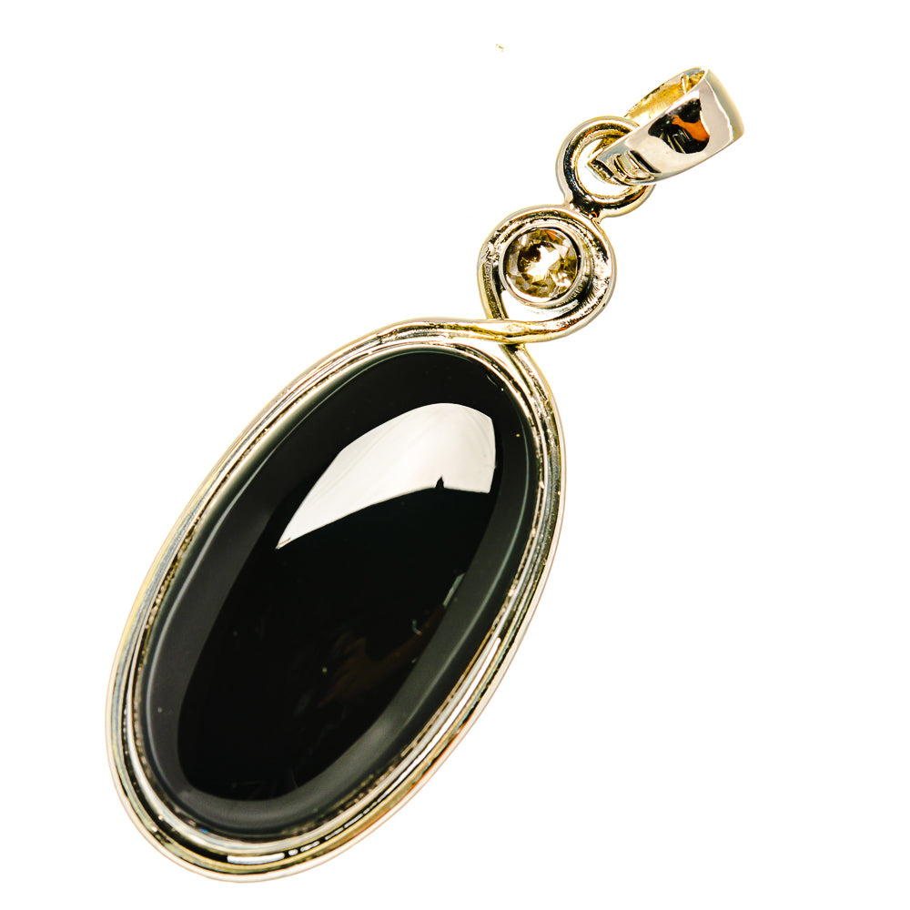 Oval black onyx pendant with quartz accent, polished 925 sterling silver bail and frame