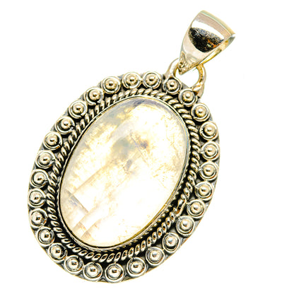 Rainbow moonstone pendant, oval bezel with beaded border and silver loop bail