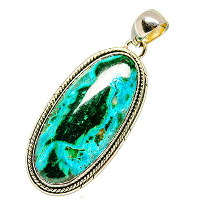 Oval green-and-turquoise stone pendant in silver bezel with loop bail