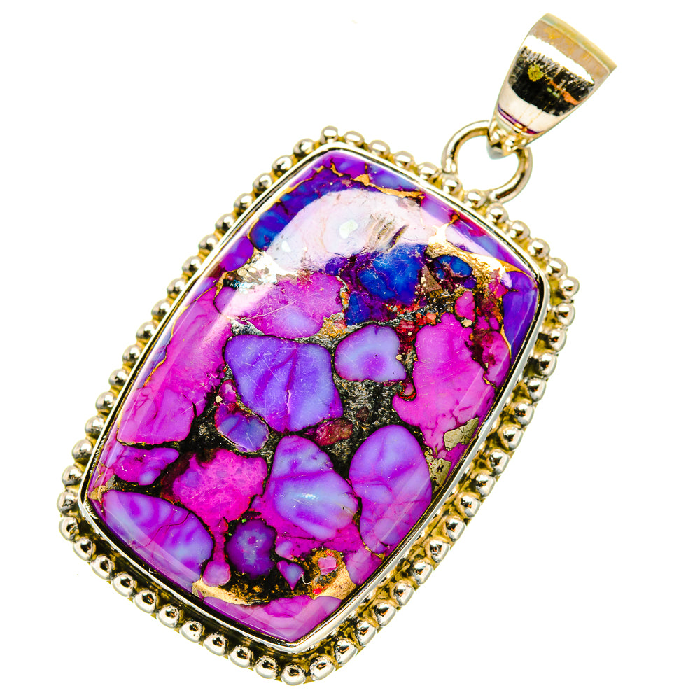 Gold-tone pendant with purple-blue turquoise stone, oval bezel and loop bail.
