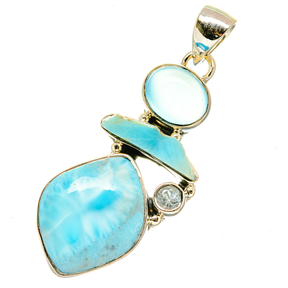 Sterling silver pendant with oval, round, and bar-set blue gemstones