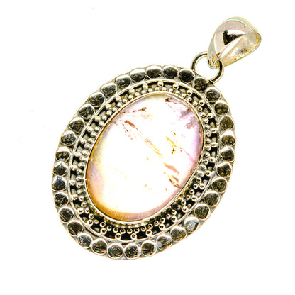 Oval sterling silver ametrine pendant with dark bead halo and light pink gemstone cabochon
