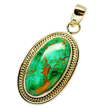 Oval chrysocolla pendant in gold-tone sterling silver with textured bezel and loop bail