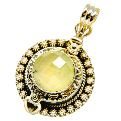 Sterling silver prehnite poison pendant with round yellow-green stone and detailed halo