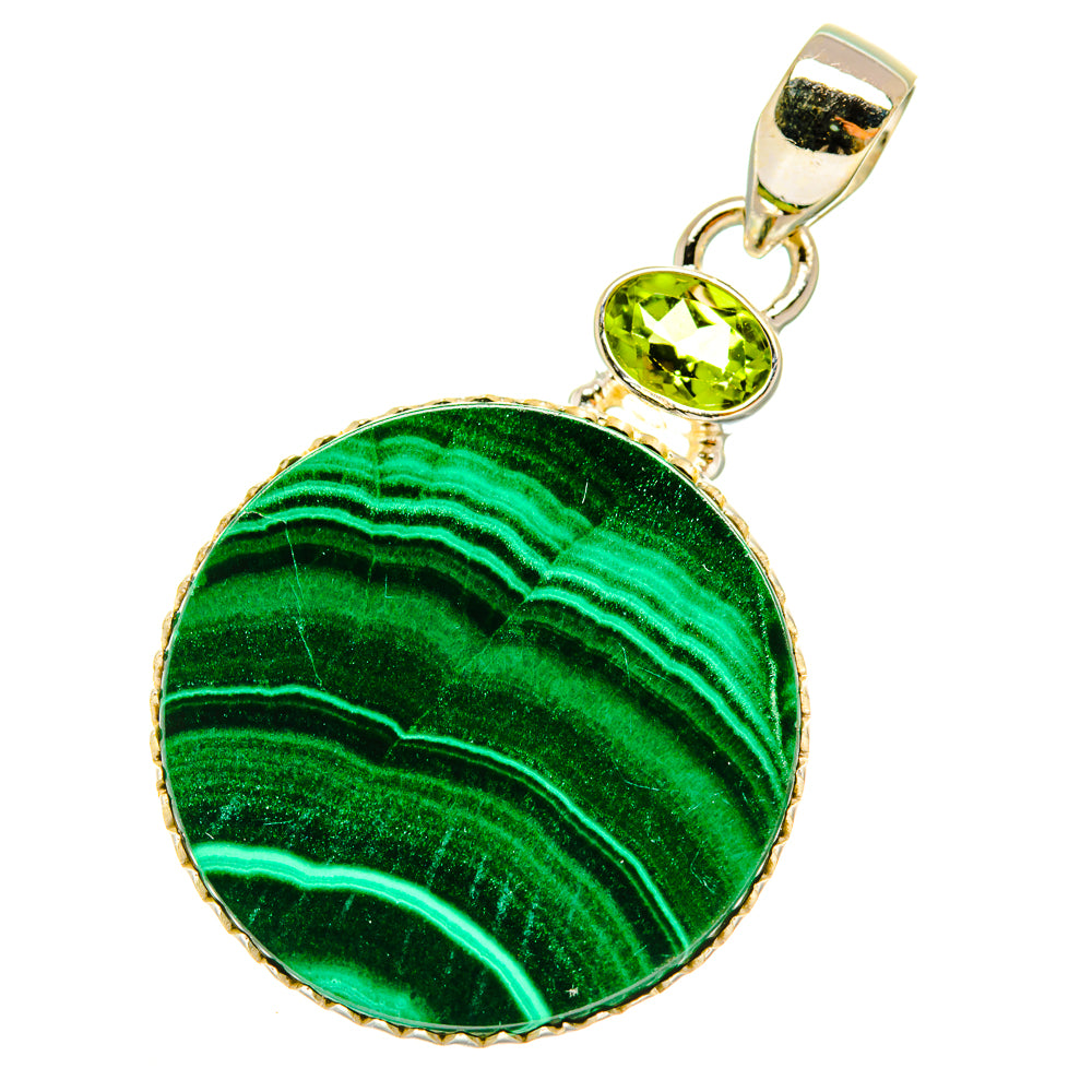 Green malachite round pendant with peridot cabochon and silver bail, side view.