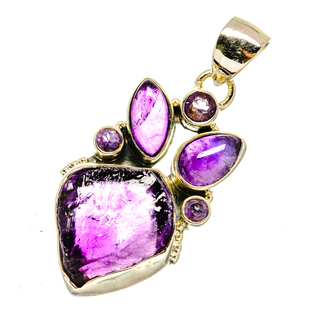 Rough amethyst pendant in 925 sterling silver with purple gemstone cluster and bail