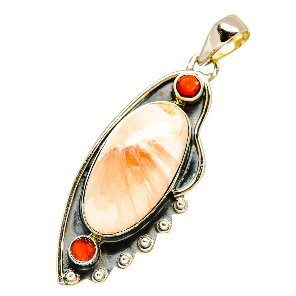Sterling silver pendant with peach teardrop gemstone and red cabochon accents, bail top