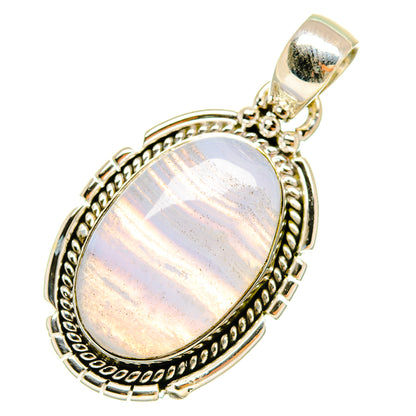 Sterling silver lace agate pendant with oval blue-gray cabochon and ornate frame